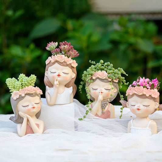 Pot de fleurs en résine petite fille